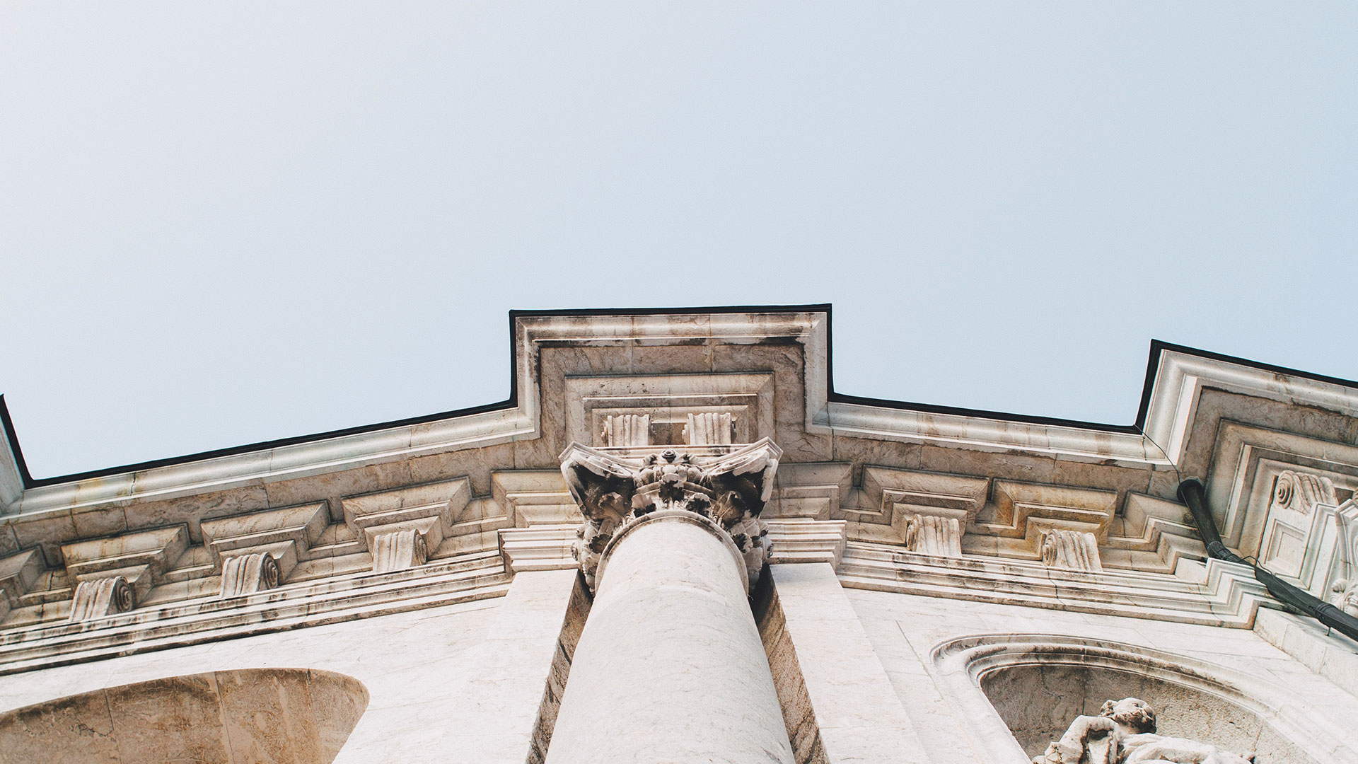 straight view looking up at column architecture on government building